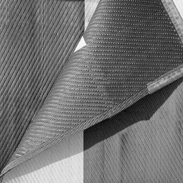 Detalle del material flexible y resistente de la alfombra Brunner Balmat Premium mostrando su acabado