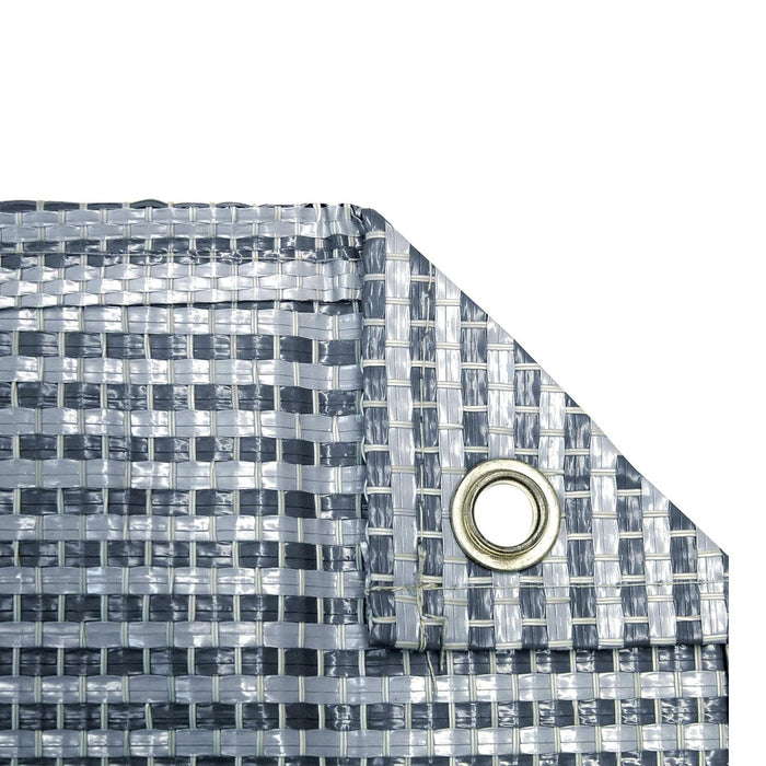 Detalle del tejido reforzado y ojal metálico de fijación de la alfombra BRUNNER Kinetic Veranda 600