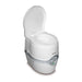 Vista lateral del inodoro portátil Thetford Porta Potti 565E con la tapa abierta