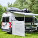 Furgoneta camper equipada con toldo y soporte Thule para escalera instalado en el lateral